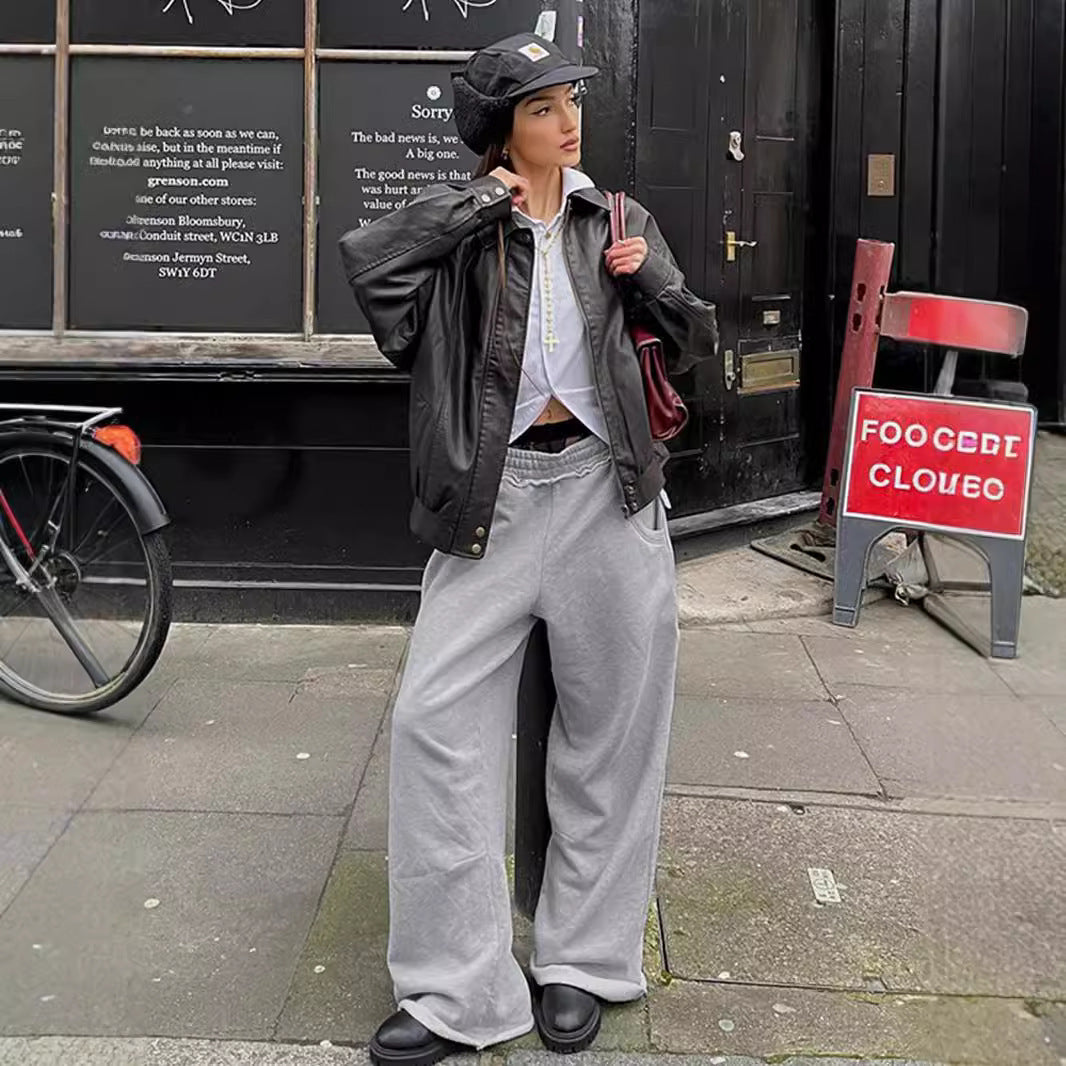 Wide-leg, high-waisted gray pants