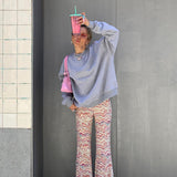 Eleganti pantaloni svasati a vita alta