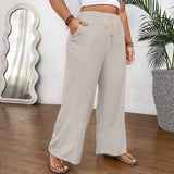 Pantaloni larghi con coulisse e gambe larghe