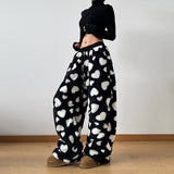 Pantaloni jogger a pois in lana d'agnello