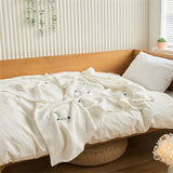 Bestickte Kindersofadecke