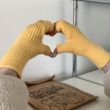 Enfärgade stickade ullhandskar med halvfinger i akryl