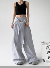 Wide-leg, lace-up pants with stripes